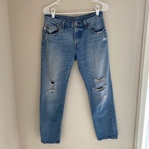 Levis 501 cropped destroyed jeans.